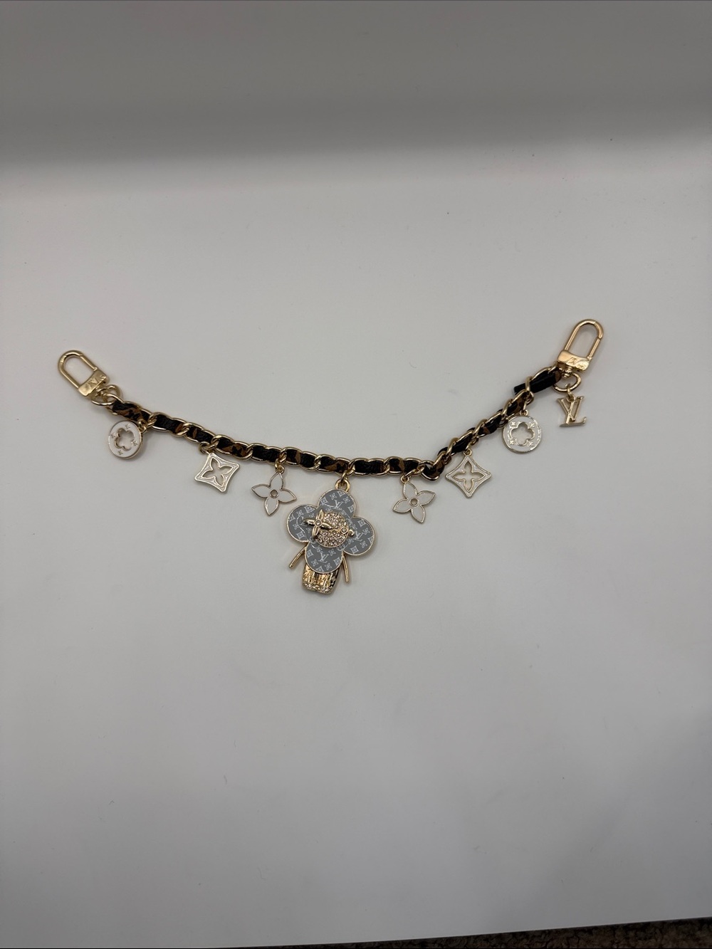1462. Gold and Black Charm Bag Chain with Vivi Pendant 11”